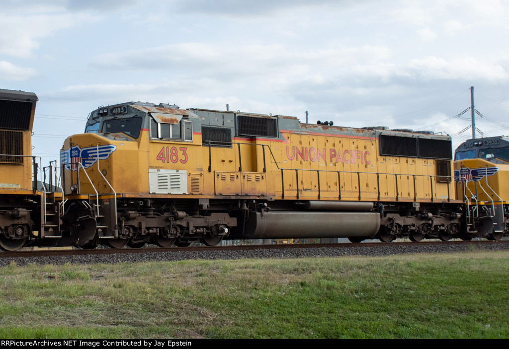 UP 4183 trails on an eastbound manifest